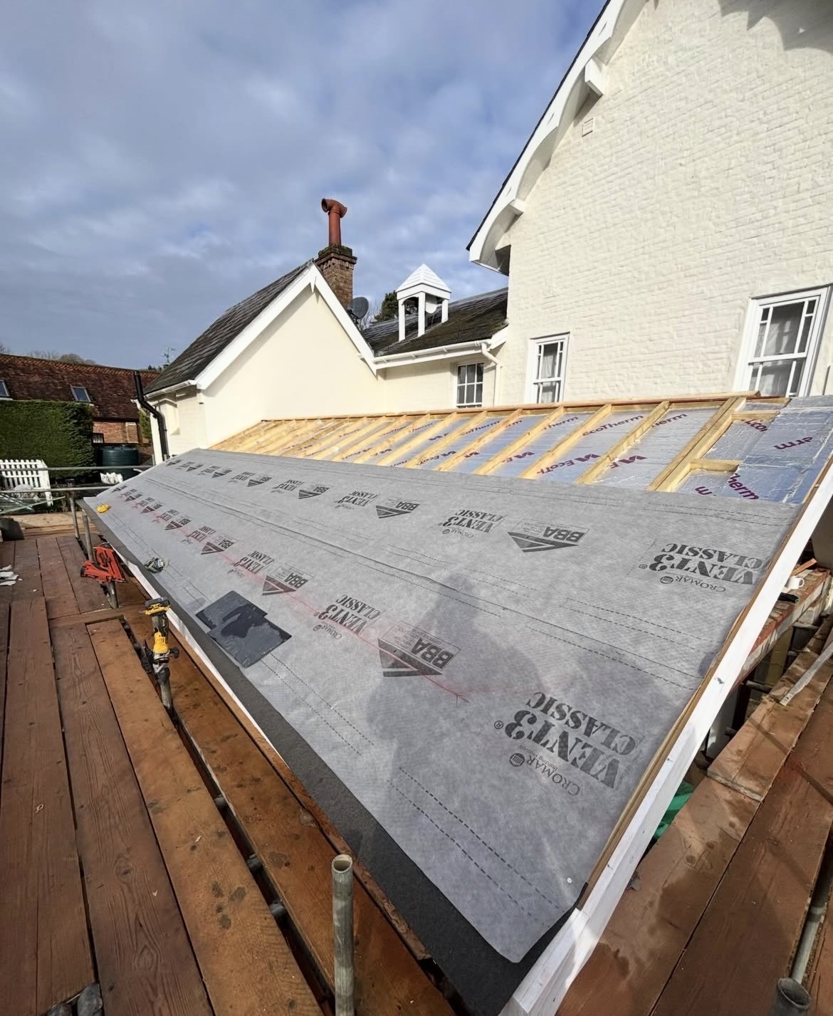 Roof felt and batten stage