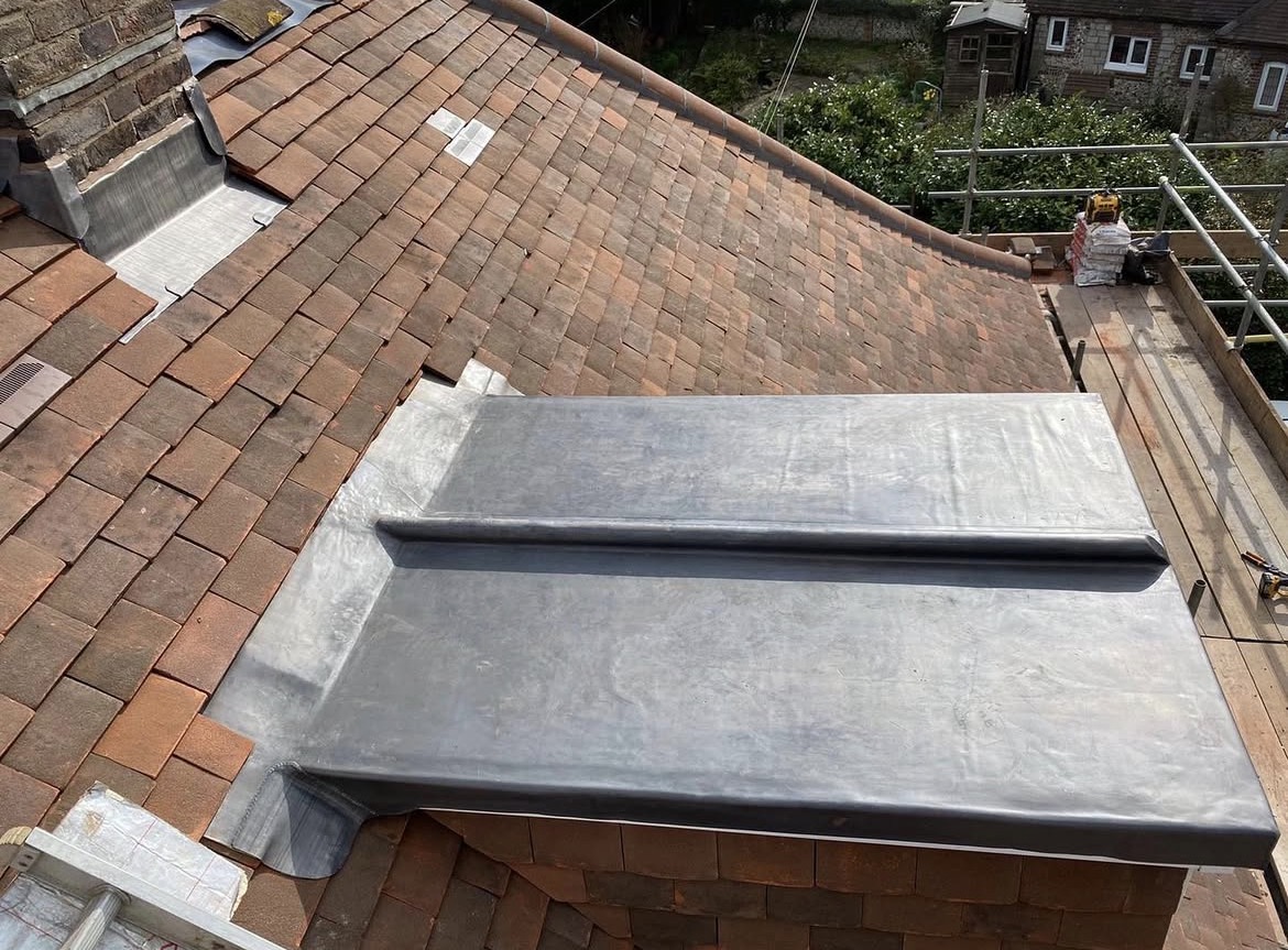 Leadwork on tiled roof